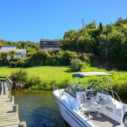 Holiday accommodation with jetty boating holiday